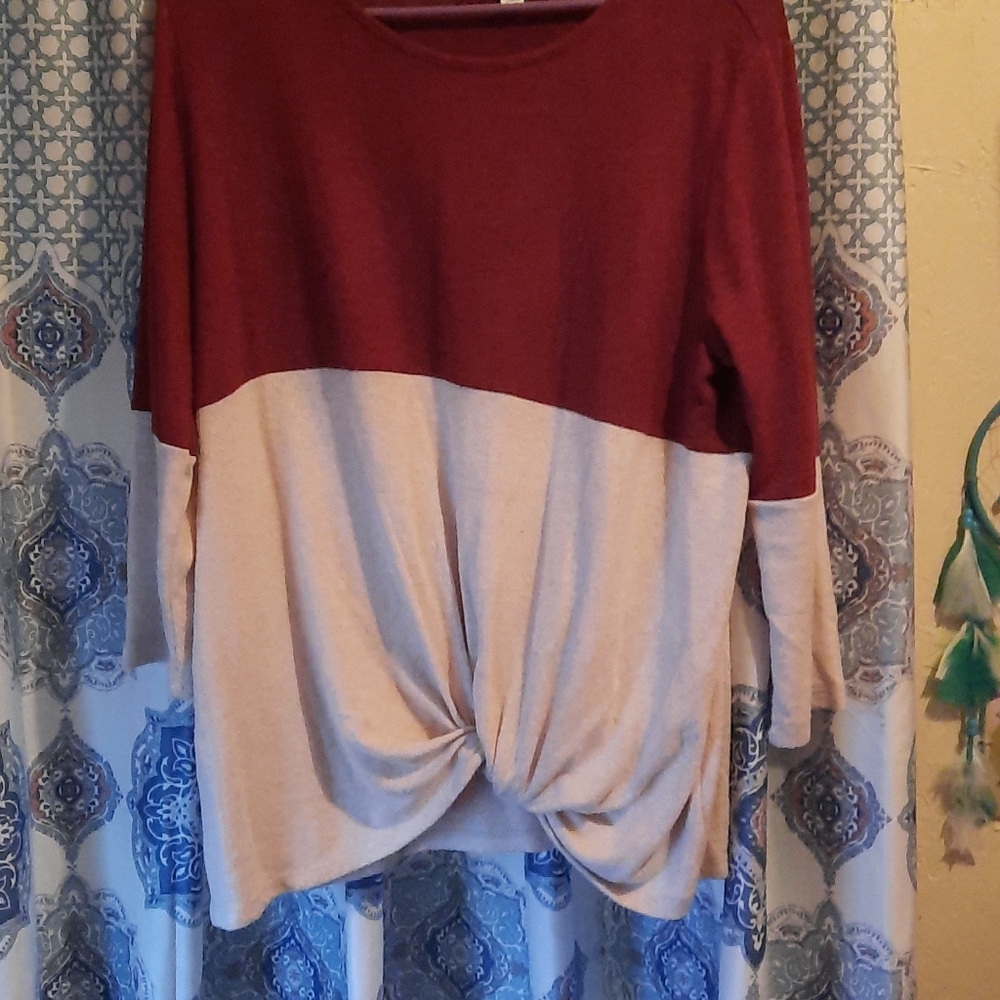 Red and tan sweater